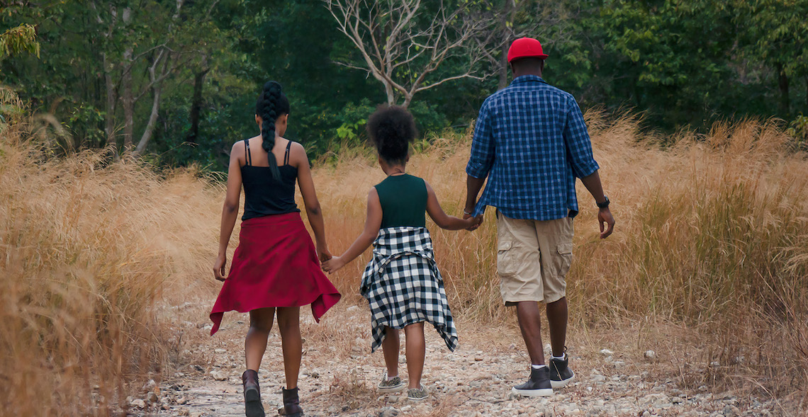 african american family hiking