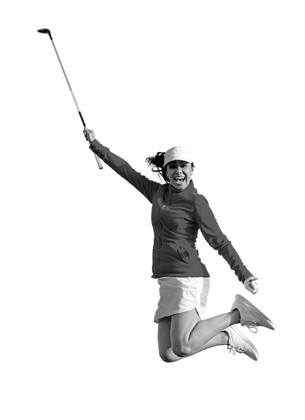 A woman golfer jumping for joy with a golf club held in the air. black and white cutout image.